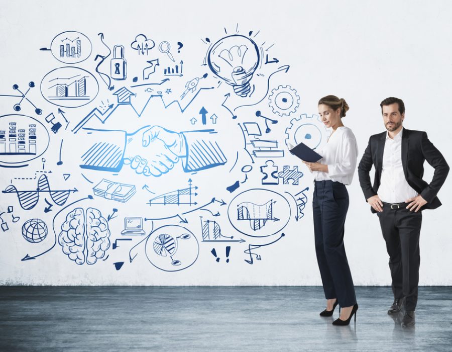 Two,Colleagues,,Man,And,Woman,Standing,Near,Business,Strategy,Plan